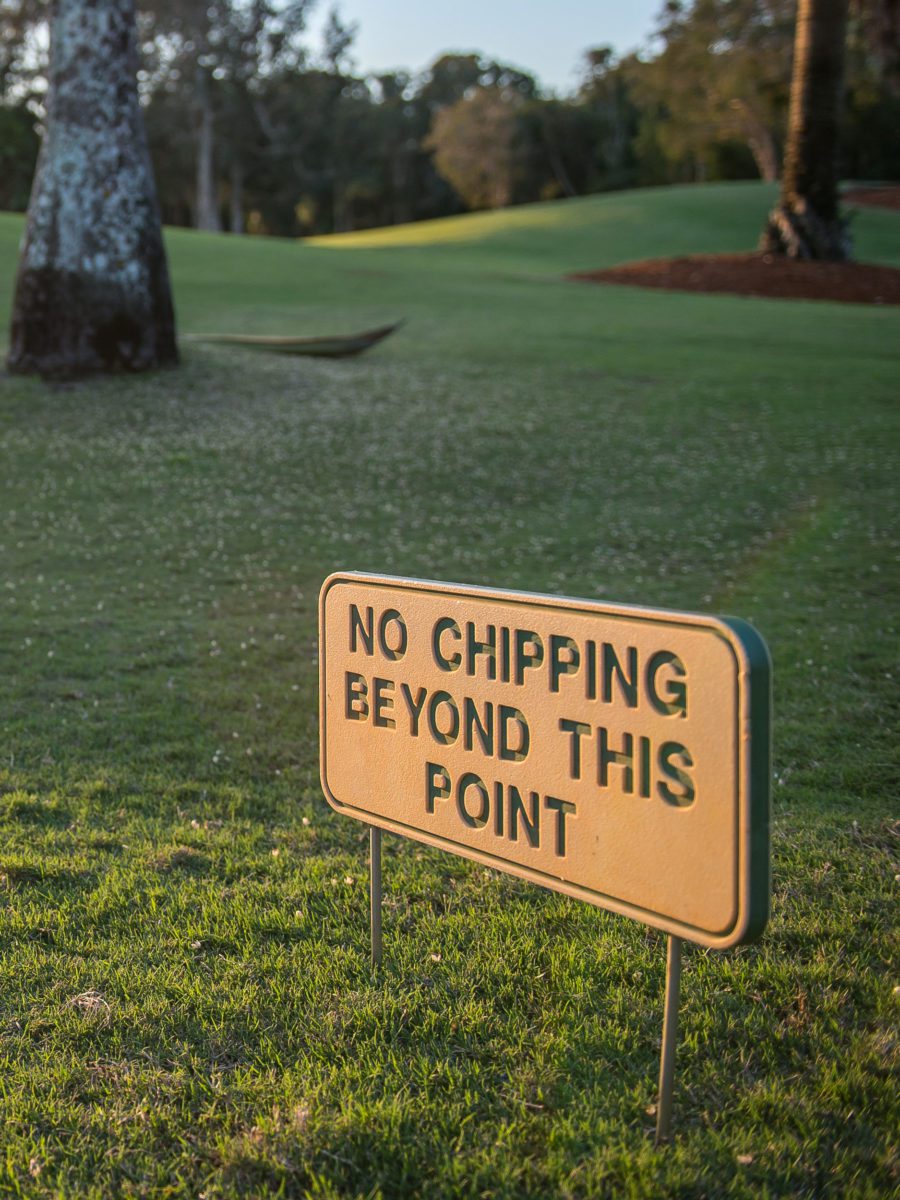 View of a Golf Sign saying no chipping Beyond this point