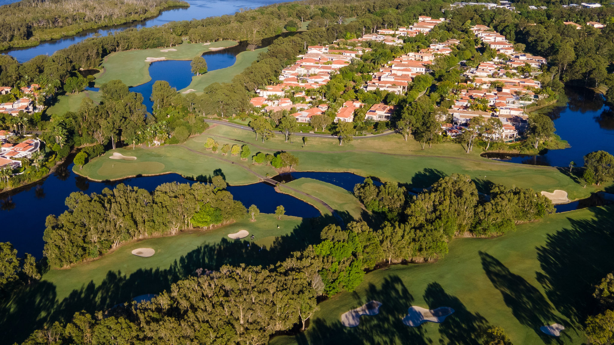 Noosa Springs Aerial Shot with Lakes, Holes and houses in the Back
